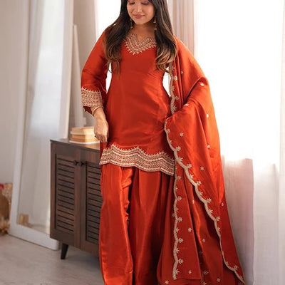 RUST ORANGE COLOR ROMAN SILK EMBROIDERED FARSHI SALWAR SUIT