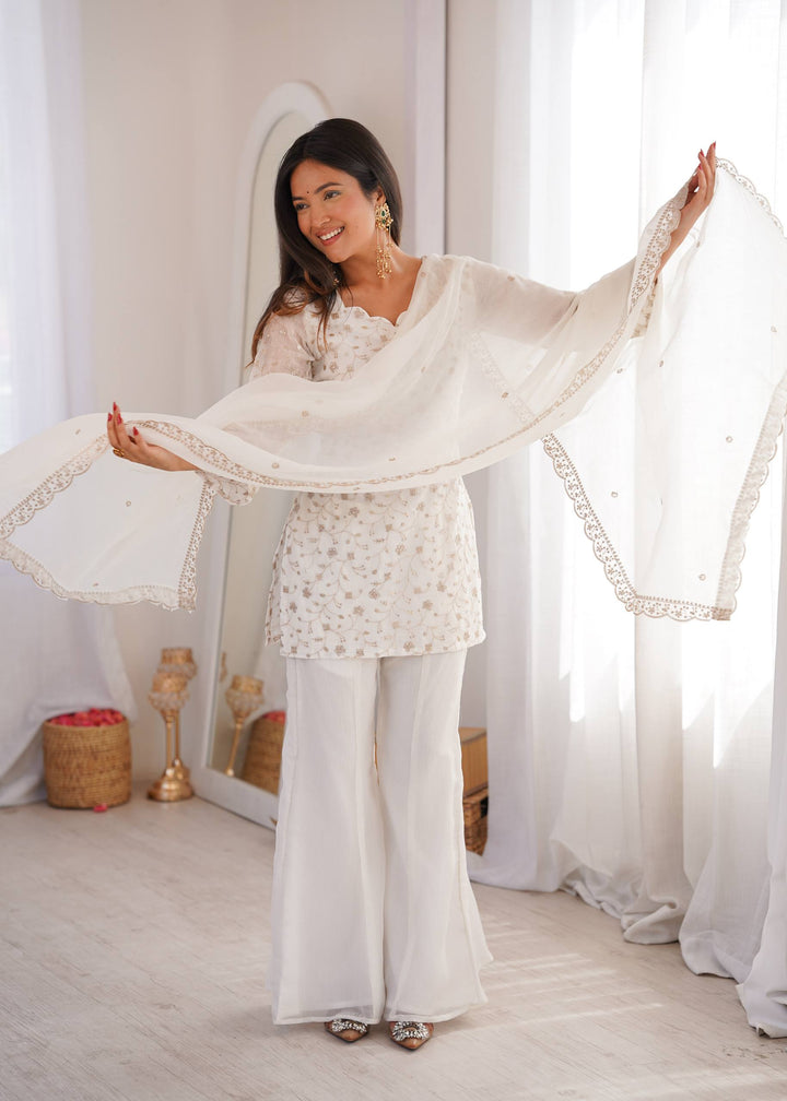 VIRAL WHITE EMBRODARY SHORT KURTI WITH BOOT CUT PLAZZO SUIT