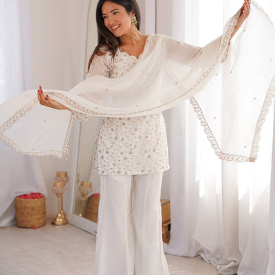 VIRAL WHITE EMBRODARY SHORT KURTI WITH BOOT CUT PLAZZO SUIT