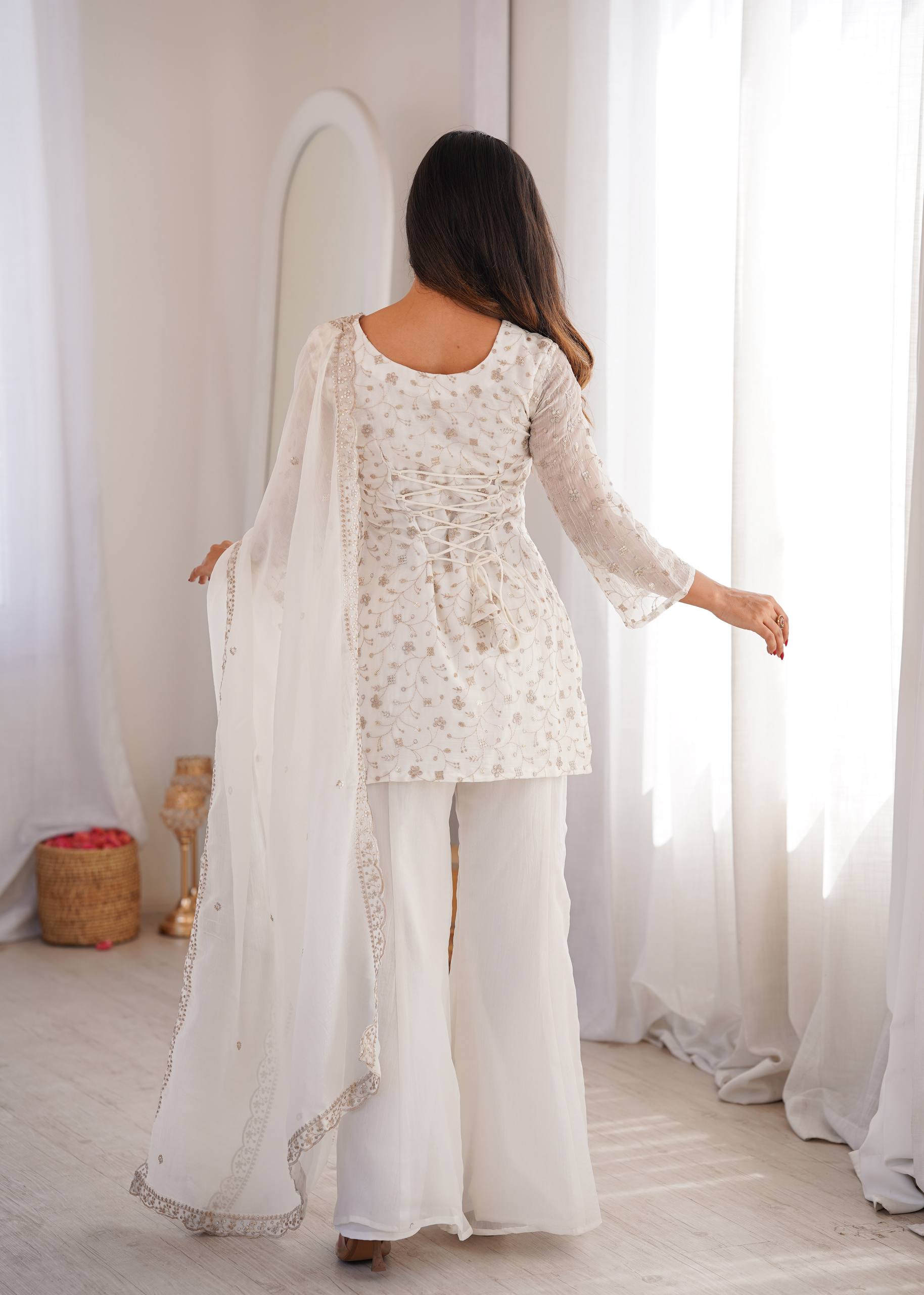 VIRAL WHITE EMBRODARY SHORT KURTI WITH BOOT CUT PLAZZO SUIT