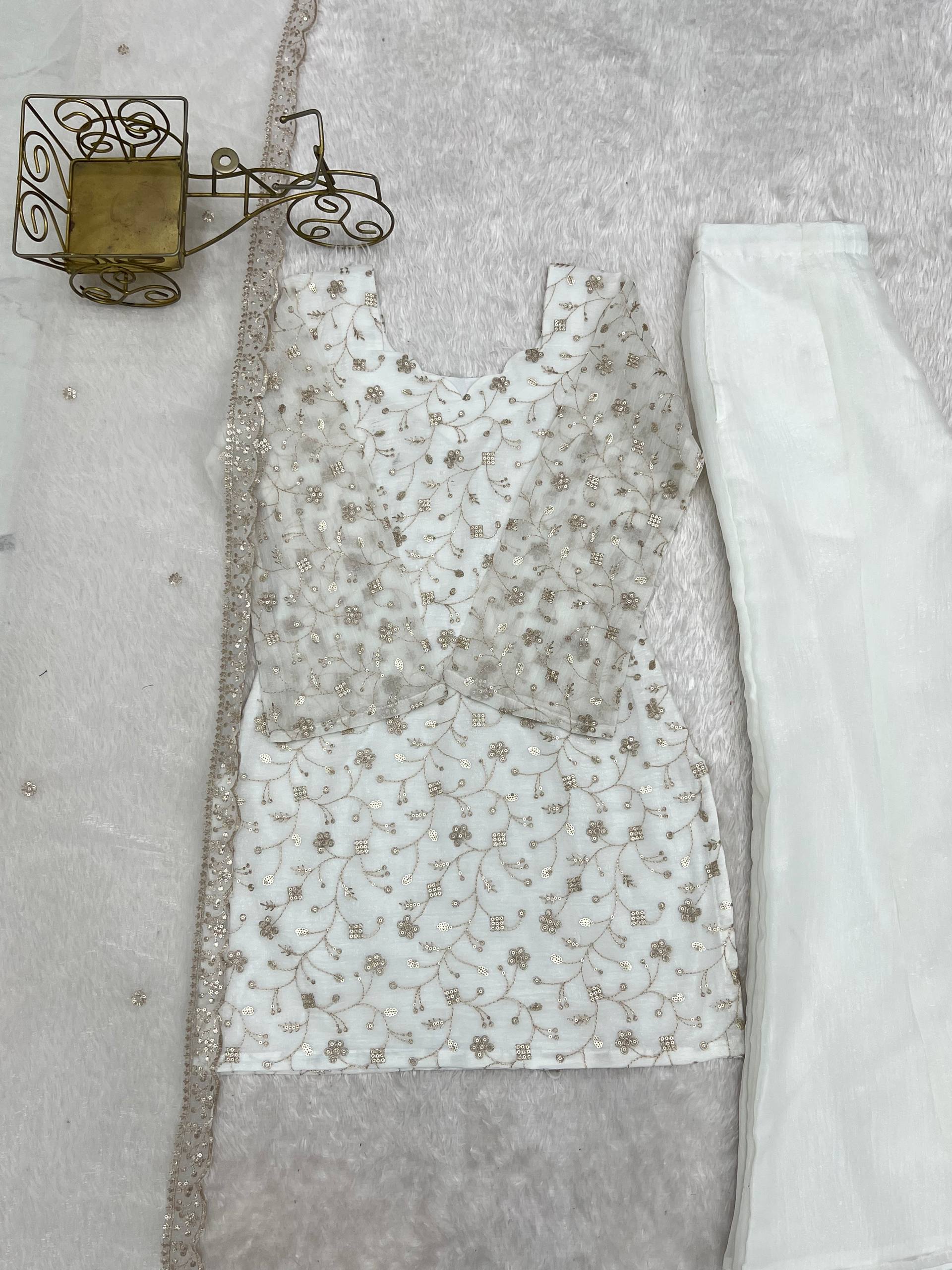 VIRAL WHITE EMBRODARY SHORT KURTI WITH BOOT CUT PLAZZO SUIT