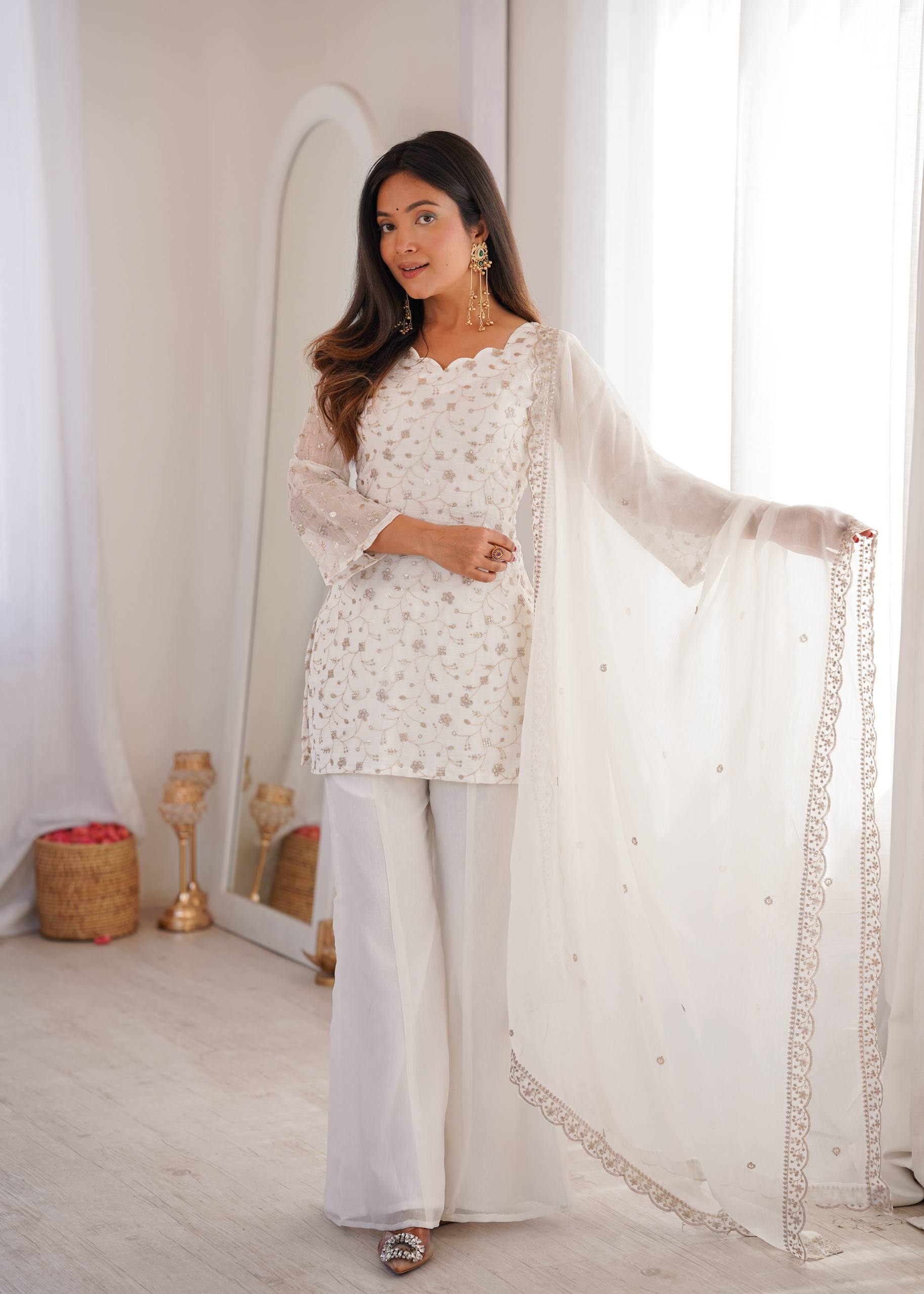 VIRAL WHITE EMBRODARY SHORT KURTI WITH BOOT CUT PLAZZO SUIT